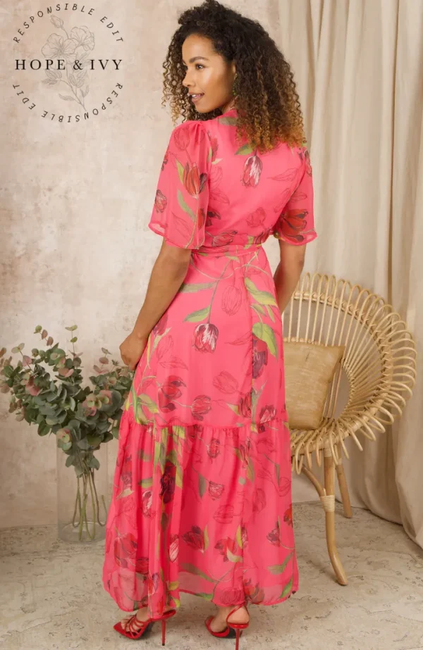 Hope & Ivy Occasionwear<THE HARMONY FLUTTER SLEEVE MAXI WRAP DRESS (PINK FLORAL)